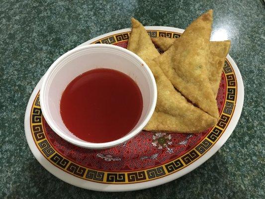 Crab wontons and sweet and sour sauce