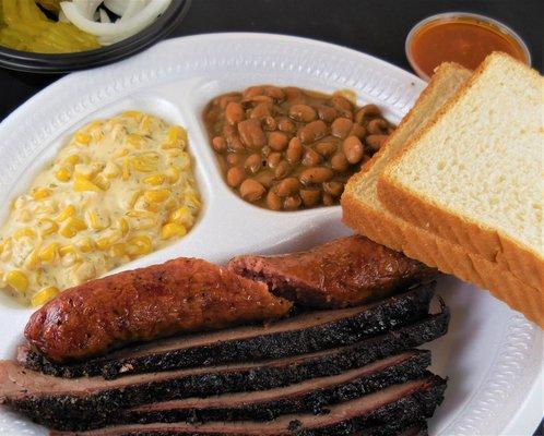 Brisket and sausage plate with Mexican cream corn and pinto beans.