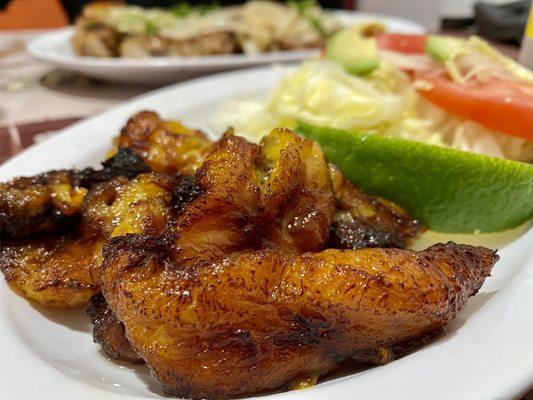 Plantains! Side salad and chops in back yum yum yum! :)...