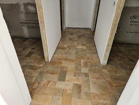 6x12 Toscana Tumbled Travertine installation on a commercial community.