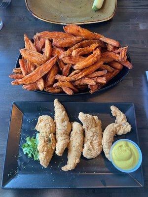 Side of sweet potato fries and chicken tenders