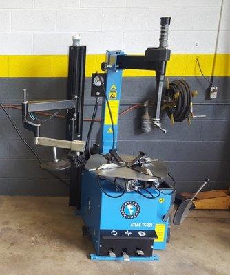 New Tire machine capable of doing any tire up to 24"