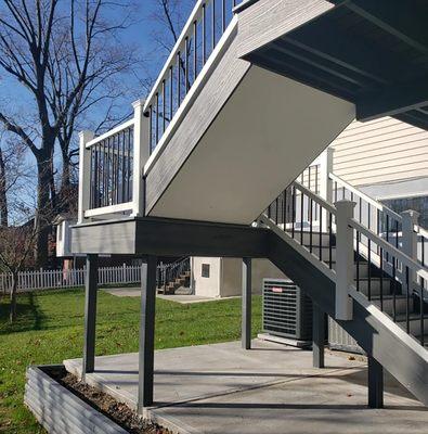 Composite Deck Stairs with Railings built by Decks By Murray