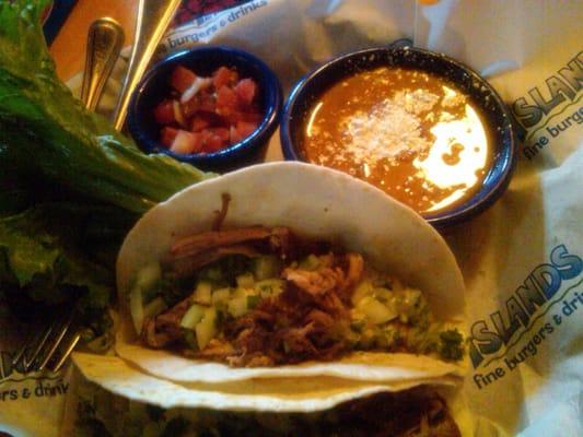 Carnitas soft tacos...yummy! But they should use corn instead of flour tortillas!