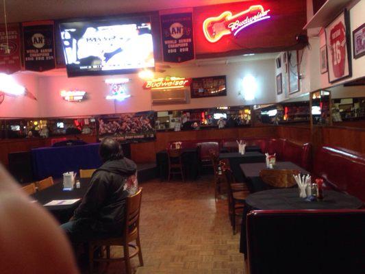 Dining room with giant tv and NFL Ticket