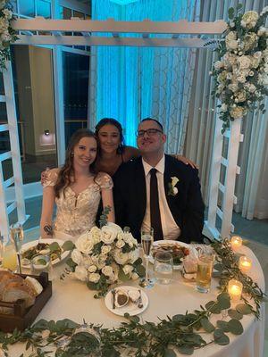 Our archway and my bouquet along with some eucalyptus for our sweetheart table