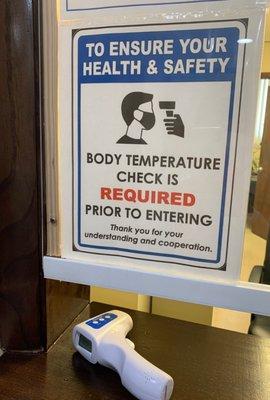 Body temperature check is required.