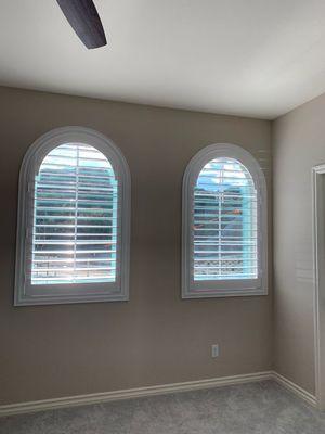 Arch shutters