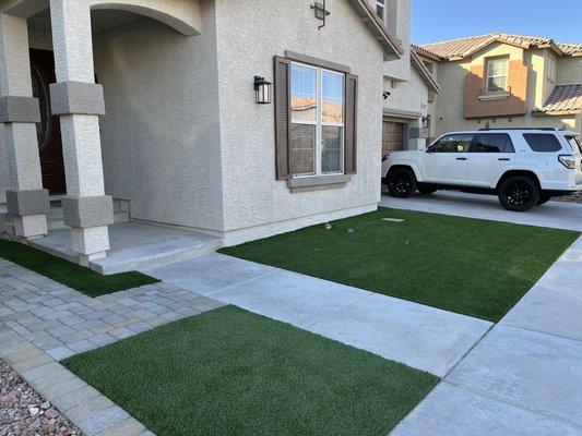 Completed front yard with grass.