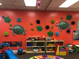 Boise Daycare's One Year Old Room, with slides and small climbing structures, our little friends are ready to start moving and exploring