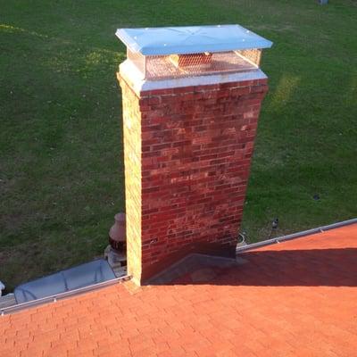 Stainless Steel Chimney Cap and "Flash Seal" Flashing Sealer. Sold and installed by Chimney Sweep Experts.