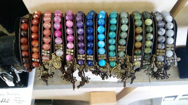 Hand crafted with leather and polished stone bead bracelets.