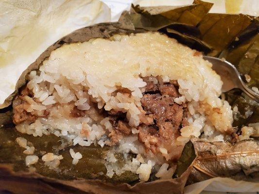 Lo mai gai sticky rice wrapped in lotus leaf.  Microwave 1:40