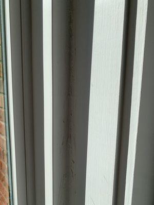 Really uneven and ugly caulking job around windows