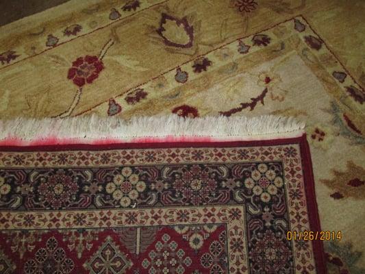 Rugs being washed in the shop. We fixed this fringe bleed after being cleaned by a steam cleaner.