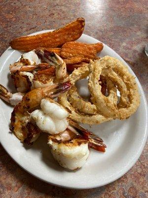 Shrimp - Mesquite grilled w/ sweet potato fries and onion rings. This place is awesome. Will be back for sure.