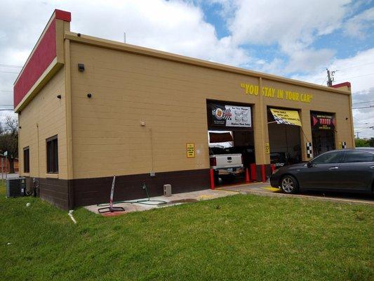 You stay in your car during the entire oil change like the sign says.