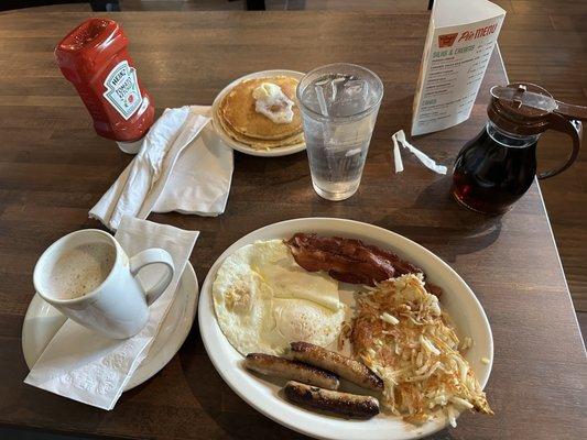 all-star breakfast w/ pancakes and hash browns. cappucino