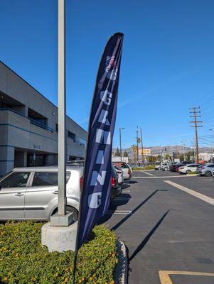 The flag to the entryway of the shop