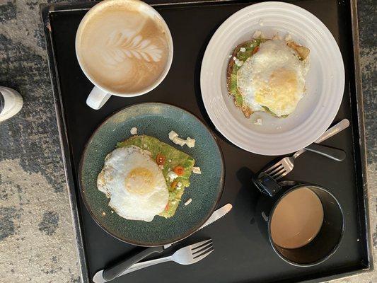 Avocado bliss with an egg, white chocolate mocha, and Americano with cream.