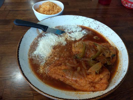 Chile Relleno plate. Delicious frijoles covered in delicious Cotija cheese. Rice was good.