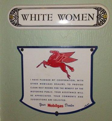 Here is the public "White Women" ladies restroom sign.