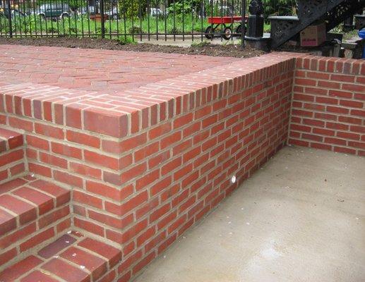 Patios and retaining walls in historic neighborhoods require special construction to withstand the forces of tree roots and ground shifts.