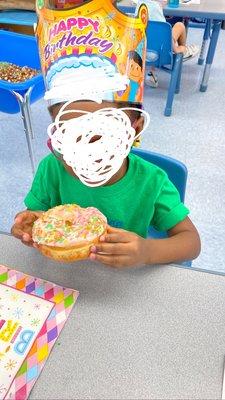 She really enjoyed her special Vanilla sprinkle raised donut