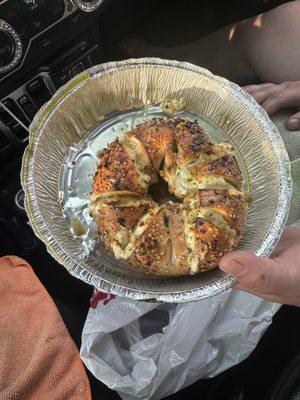 Everything stuffed bagel with vegetable cream cheese