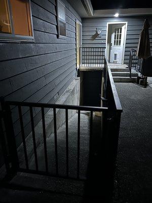 Too dark for justice. Gate and railing to basement. And our porch updated as well.