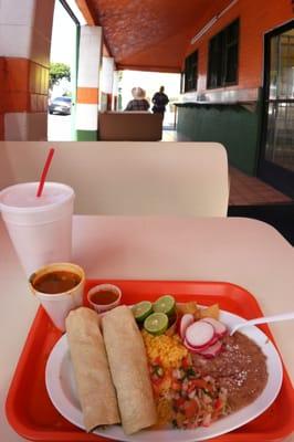 Couple of savory tacos enjoyed in the outdoor dining area on a cool October day.