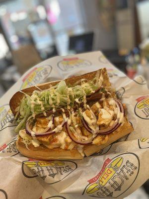 Craving spicy? This is the Sunburn: grilled chicken with spicy buffalo wing sauce, melted jack cheese, bacon, lettuce, onion, ranch