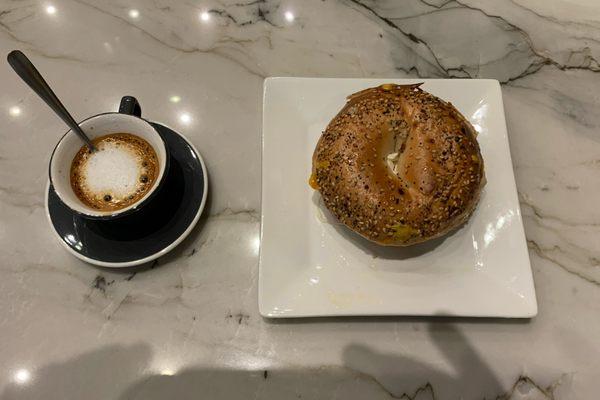 Macchiato and bagel sandwich (egg + cheese)