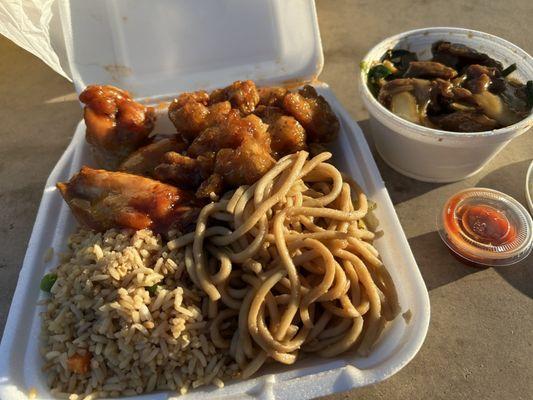 Mongolian beef, wings, orange chicken, fried rice and chow mein.