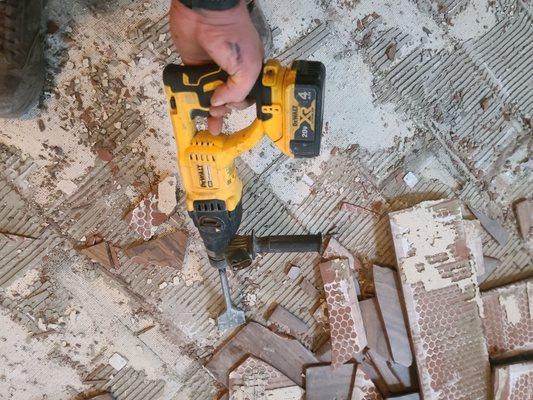 Interior ceramic stone tile demo. Yes we do that too.