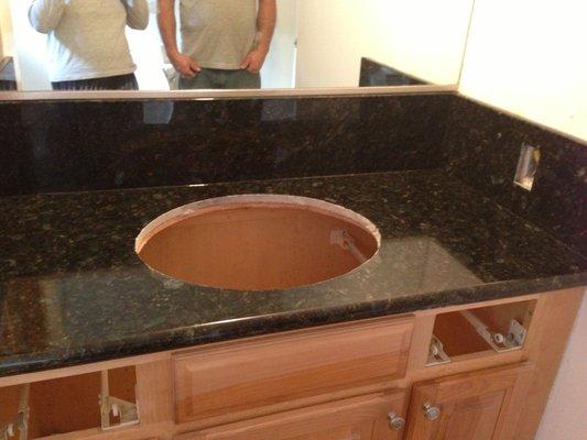 Bathroom remodel.  New granite countertop going in.