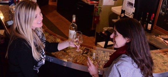 Customers enjoying wine at our Wine Bar.