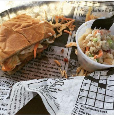 Pulled pork sandwich with a zesty slaw and a side of potato mac