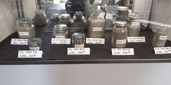 Kratom in various resealable jars