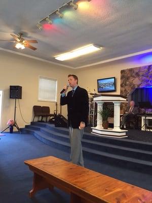 Pastor preaching the word.