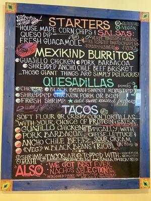 Colorful menu sign board. Enough of a variety of classics to satisfy everyone. Order at counter, they call your name when ready.