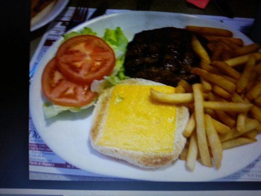 Cheese burger dulexe : burger with lettuce, tomatoes, french fries