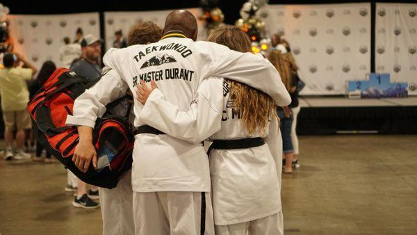 Senior Master Durant congratulating a couple of his World Champions!