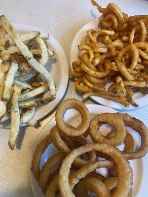 Fresh cut Plato fries, curly fries, and onion rings