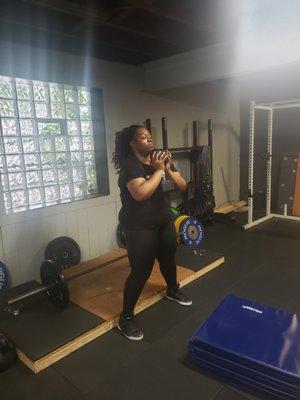 Kim in the zone during a tough goblet squat session