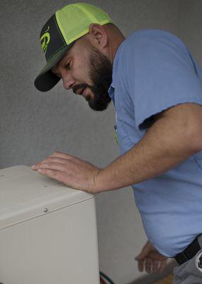 Chase servicing mini split ductless system in Kennewick, WA.