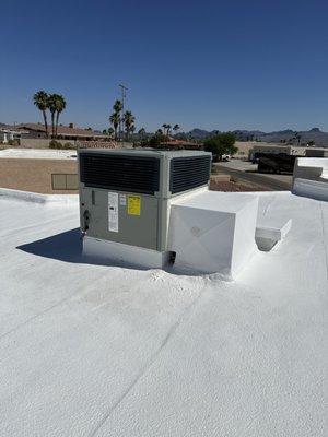 Trane 2-stage package heat pump with new foam roof. Customer was able to take advantage of Unisource Energy rebates!