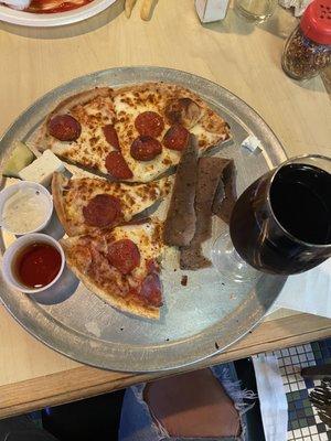 Pepperoni pizza with some gyro meat, red wine, and a small block of feta on the side. Delicious!