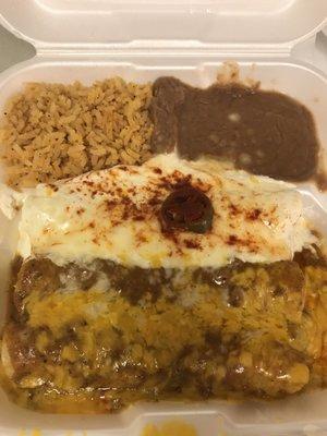 Two beef enchiladas with chili con carne & one chicken enchilada with sour cream sauce, rice, & beans to go.