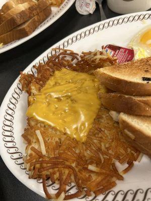 Cheese hash browns. 1 slice of American cheese